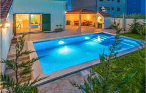 Beautiful home in Mravince with Outdoor swimming pool, WiFi and 3 Bedrooms